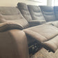Kelsee Pleather Power-Reclining Sectional