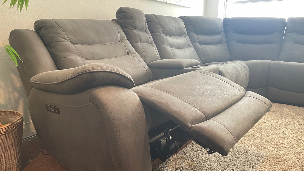 Kelsee Pleather Power-Reclining Sectional