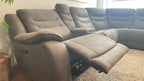 Kelsee Pleather Power-Reclining Sectional