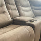Kelsee Pleather Power-Reclining Sectional