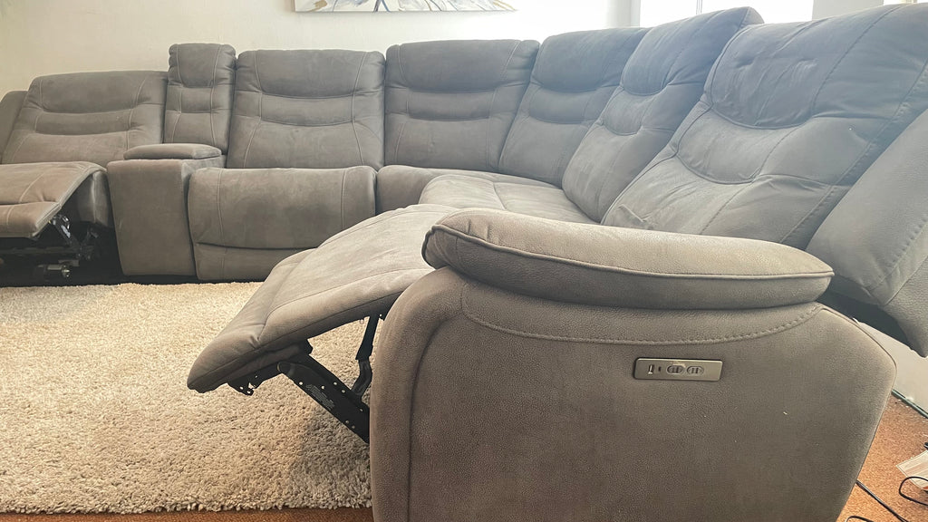Kelsee Pleather Power-Reclining Sectional