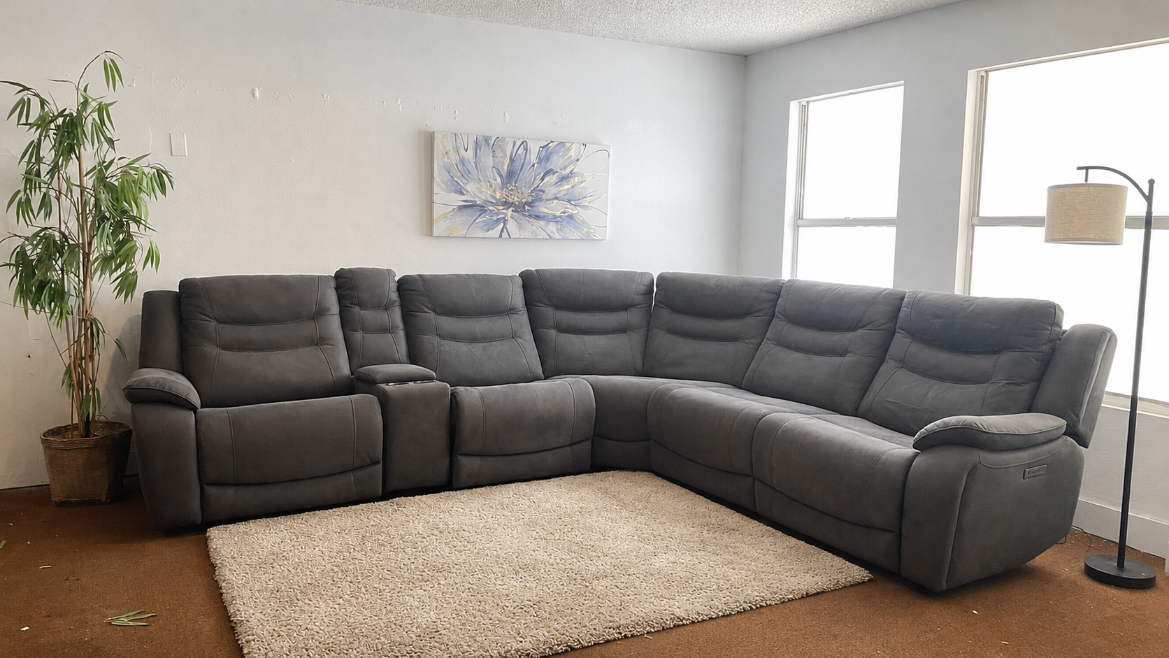 Kelsee Pleather Power-Reclining Sectional