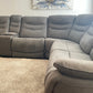 Kelsee Pleather Power-Reclining Sectional