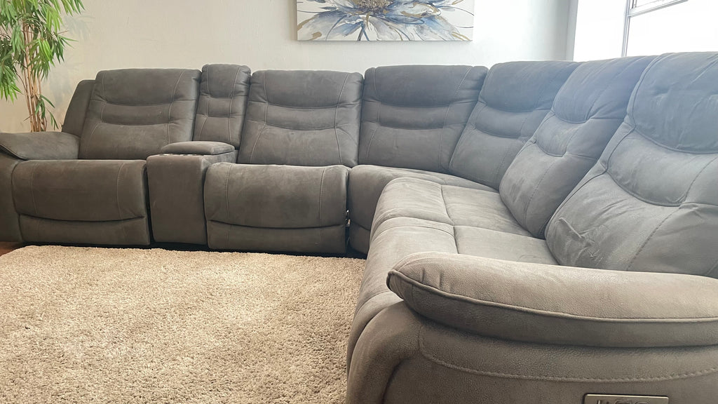 Kelsee Pleather Power-Reclining Sectional