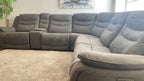 Kelsee Pleather Power-Reclining Sectional