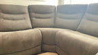 Kelsee Pleather Power-Reclining Sectional