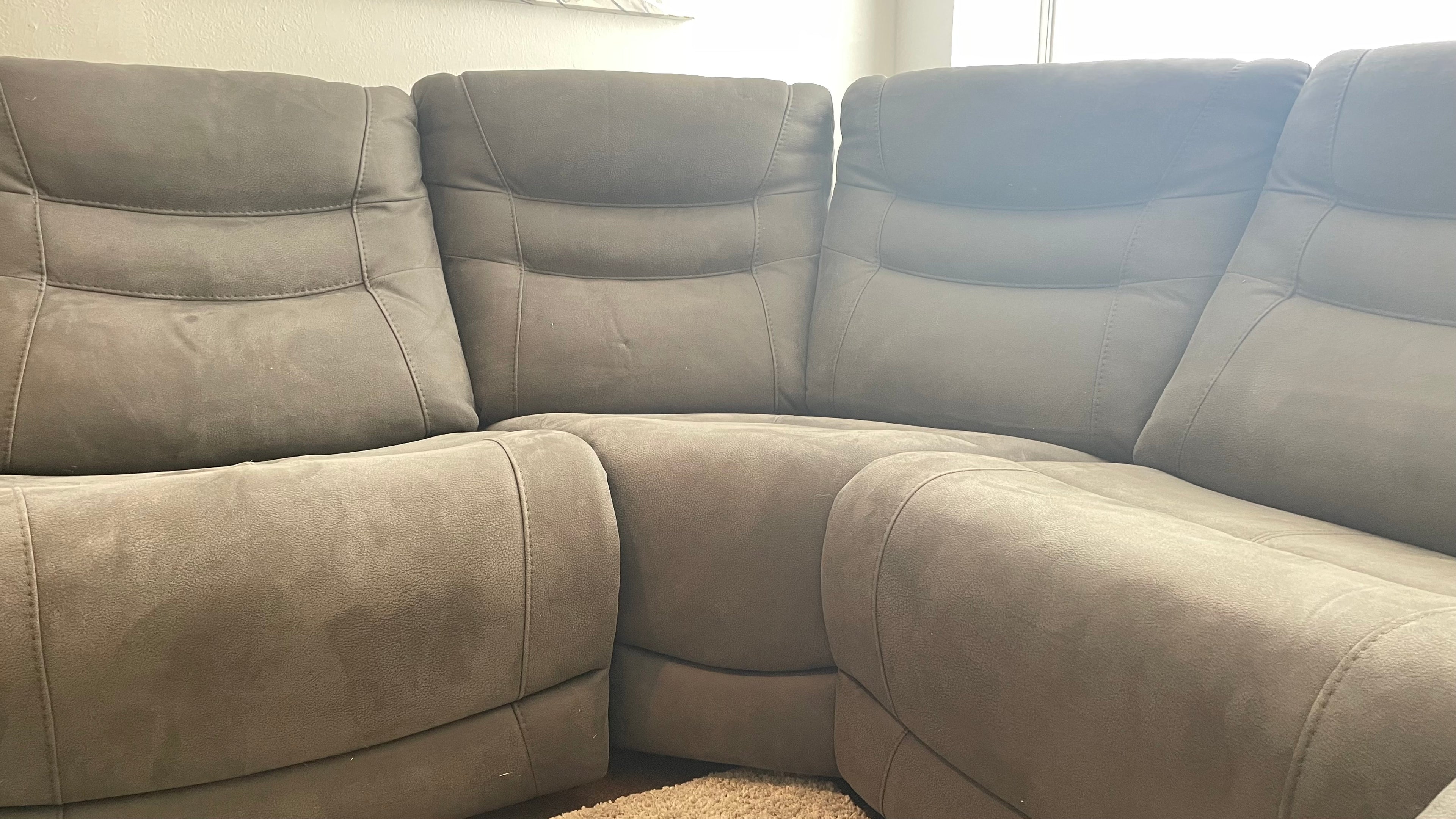 Kelsee Pleather Power-Reclining Sectional
